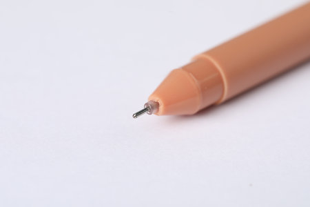 One stylish pen on light background, macro view. Space for textの写真素材