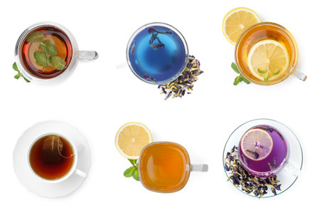 Different types of tea in cups isolated on white, set. Top viewの写真素材