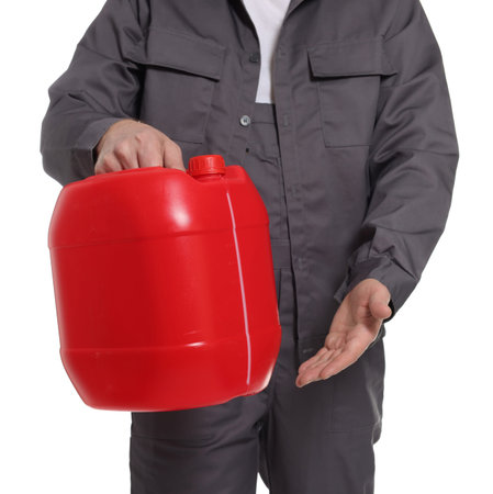 Man holding plastic canister on white background, closeupの写真素材