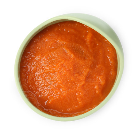 Tasty puree in bowl isolated on white, top viewの写真素材