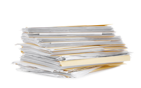 Stack of file folders with papers isolated on whiteの写真素材
