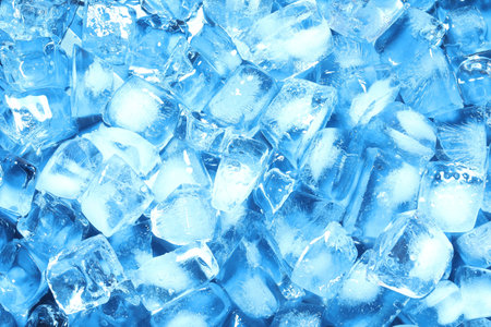 Cubes of clear ice as background, closeup