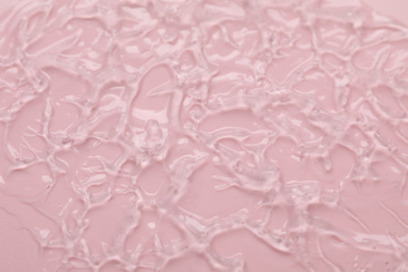 Collagen gel on pink background, above viewの写真素材