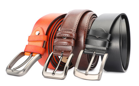 Three different leather belts isolated on whiteの写真素材