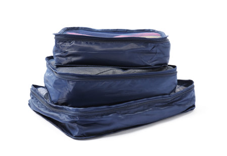 Stack of packing cubes isolated on white