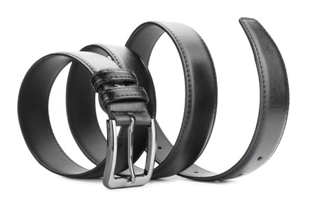 Three black leather belts isolated on whiteの写真素材