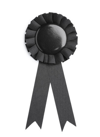 Black award ribbon on white background, top view