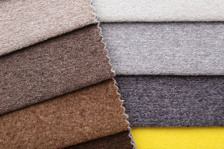 Samples of different fabrics as background, top viewの写真素材