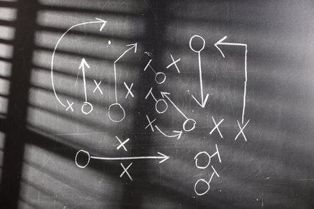 Chalkboard with scheme of American football game as background, closeupの写真素材