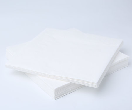 Stack of paper handkerchiefs isolated on whiteの写真素材