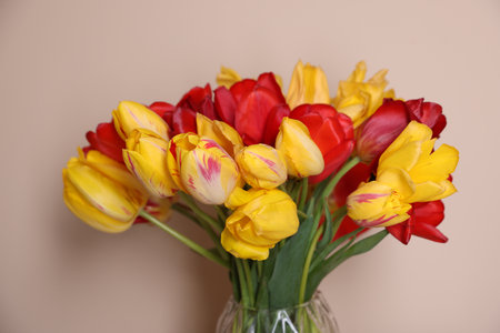 Bouquet of beautiful tulips on beige background, closeupの写真素材
