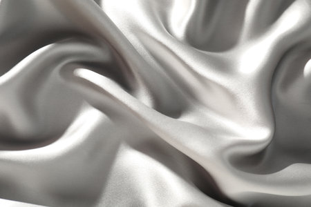 Grey crumpled silk fabric as background, top viewの写真素材