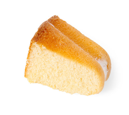 Pieces of tasty bundt cake isolated on white, top viewの写真素材