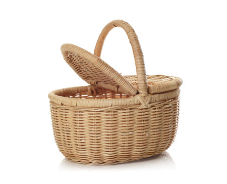 One empty wicker basket isolated on white