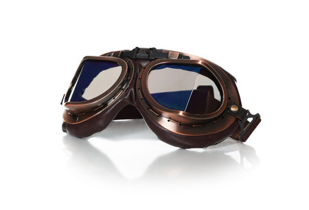 Vintage metal protective glasses isolated on whiteの写真素材