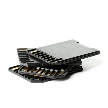 Many SD memory cards isolated on whiteの写真素材