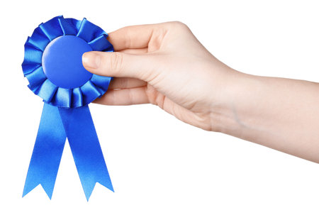 Woman holding blue award ribbon on white background, closeup