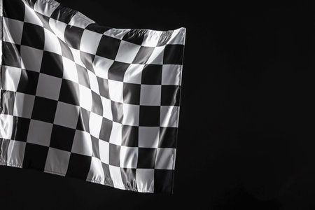 One racing checkered flag on black background, space for text