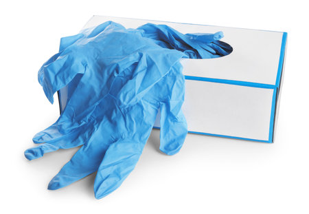 Box with medical gloves isolated on whiteの写真素材