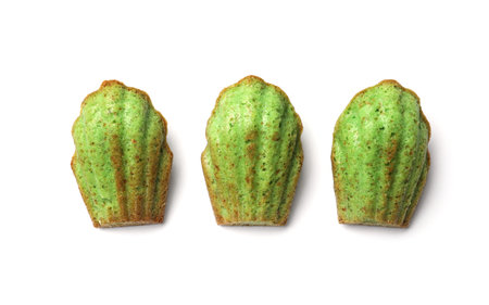 Tasty matcha madeleine cakes isolated on white, top viewの写真素材