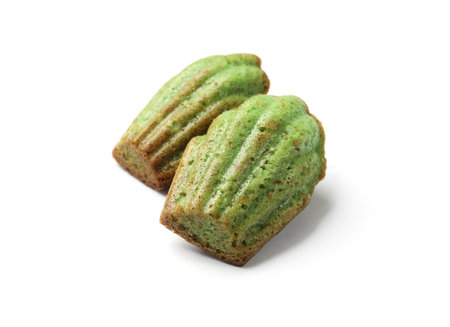 Tasty matcha madeleine cakes isolated on whiteの写真素材