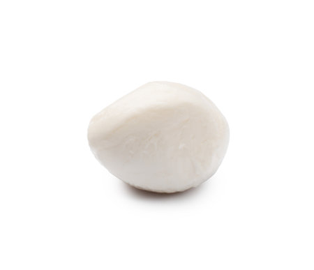 One tasty mozzarella cheese ball isolated on whiteの写真素材