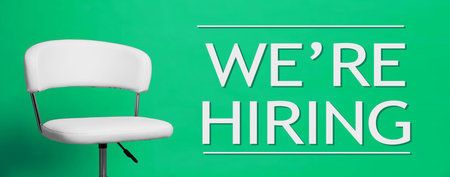 Empty office chair on green background, banner.の写真素材