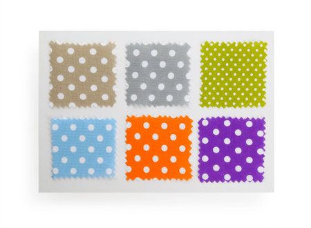 Samples of fabrics with polka dot pattern isolated on white, top view
