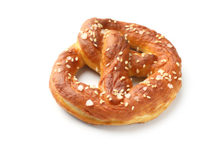 Tasty pretzel with salt isolated on whiteの写真素材