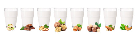 Different types of nut milk in glasses isolated on white, setの写真素材
