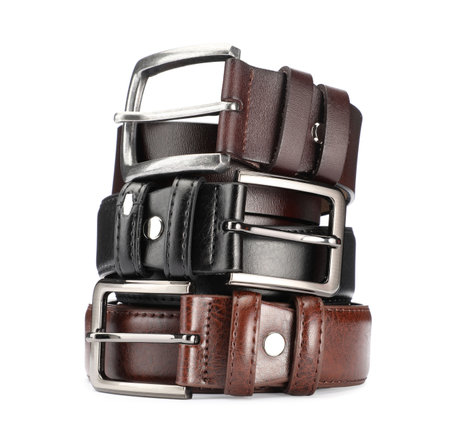 Three different leather belts isolated on whiteの写真素材