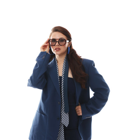 Young woman in stylish clothes on white backgroundの写真素材