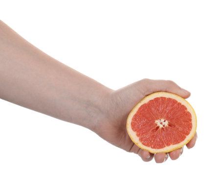 Woman with grapefruit on white background, closeupの写真素材