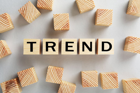 Word Trend made of wooden cubes with letters on white background, top viewの写真素材