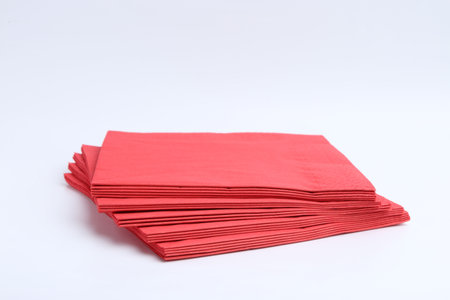 Many red paper handkerchiefs isolated on whiteの写真素材