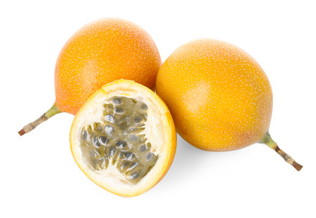 Ripe yellow passion fruits isolated on white