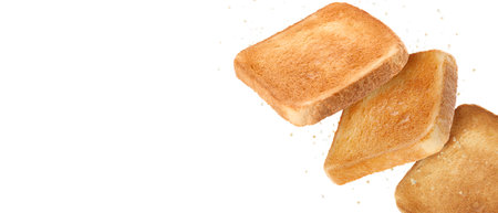 Pieces of toasted bread falling on white background. Banner design with space for textの写真素材