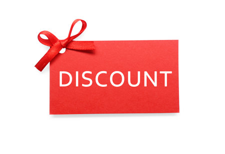 Red tag with word Discount on white background, top viewの写真素材