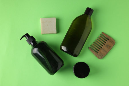 Different bath accessories on green background, flat layの写真素材