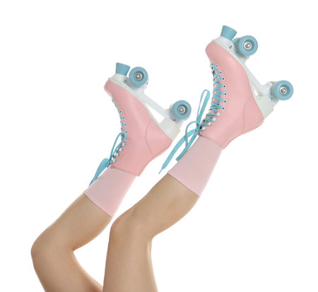 Woman in roller skates on white background, closeup