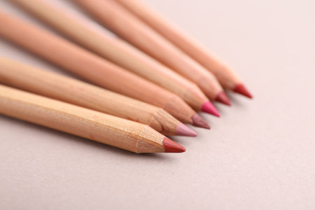 Many different lip pencils on light background, closeupの写真素材