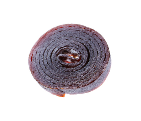 Delicious fruit leather roll on white background