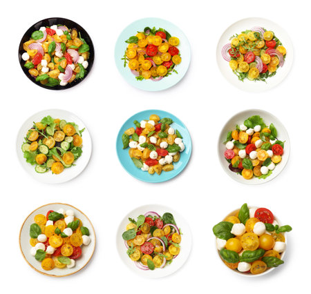 Tasty fresh salads with yellow and red tomatoes on white background, set. Top viewの写真素材