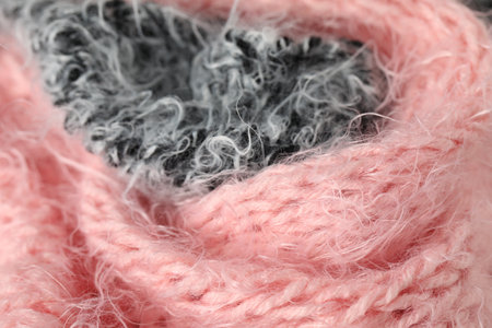 Texture of pink and grey knitted fabrics as background, closeupの写真素材
