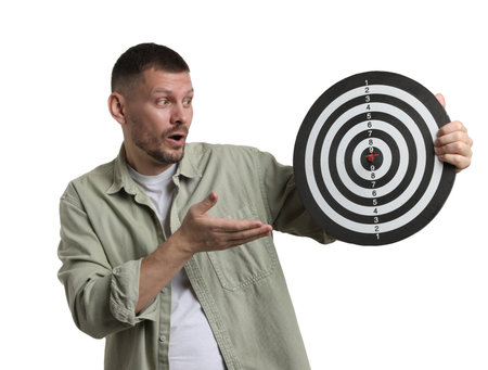 Targeting. Man with dart board and arrow on white backgroundの写真素材