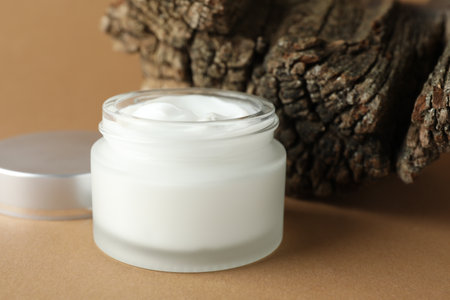 Jar of body cream on beige background, closeupの写真素材