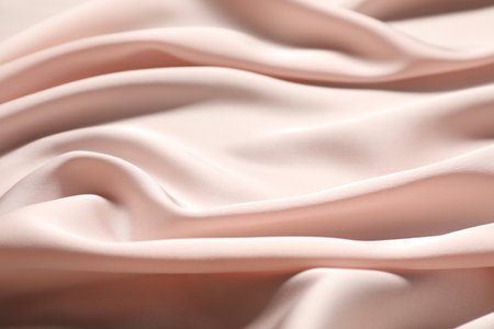 Pink crumpled silk fabric as background, closeupの写真素材