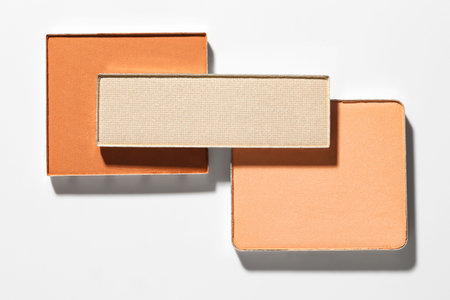 Beautiful eyeshadow refill pans on white background, flat layの写真素材