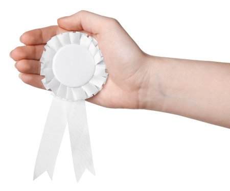 Woman holding award ribbon on white background, closeupの写真素材