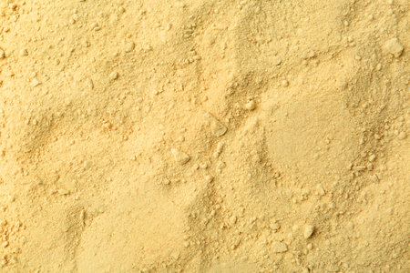 Superfood supplement. Wasabi powder as background, top view
